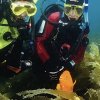 Diving Shop Immersion SA - Confignon - Plonger en combinaison étanche